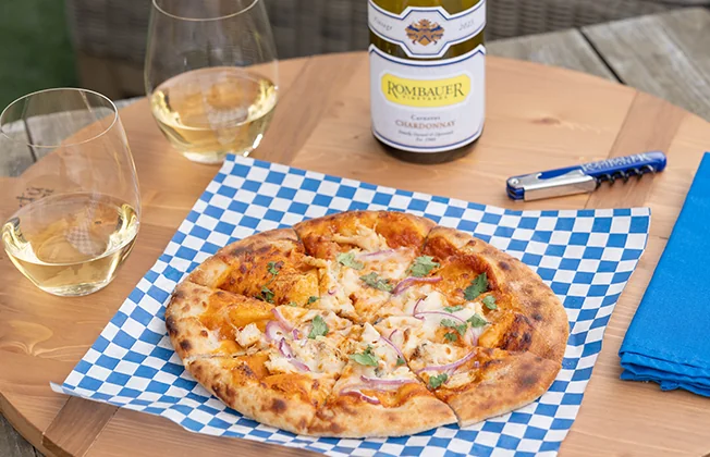 Butter chicken pizza paired with Rombauer Chardonnay