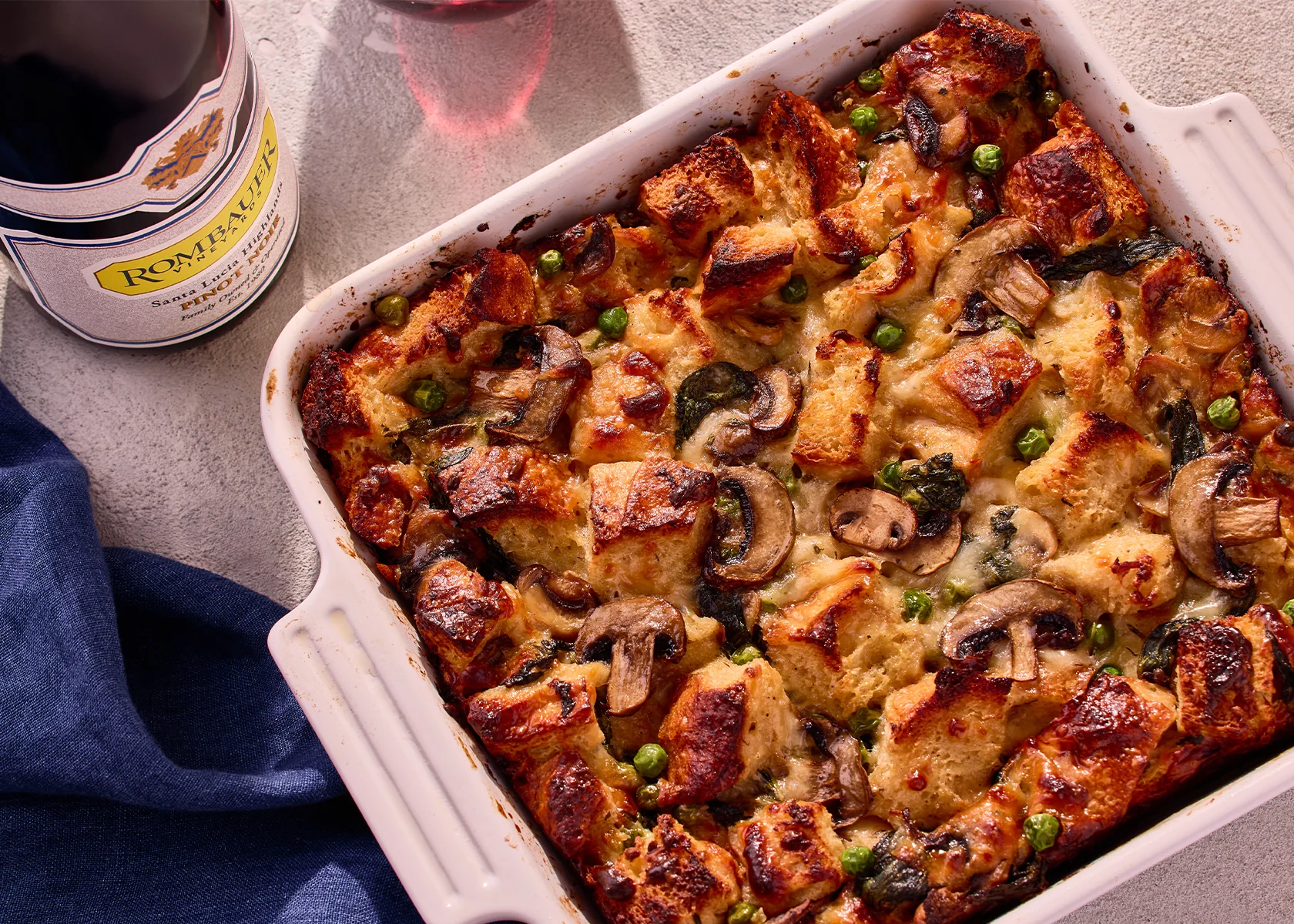 Peter Som's mushroom strata paired with Rombauer Pinot Noir
