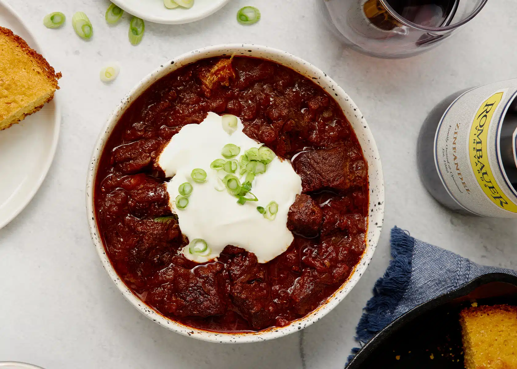 Bowl of Chili with cornbread and Zinfandel