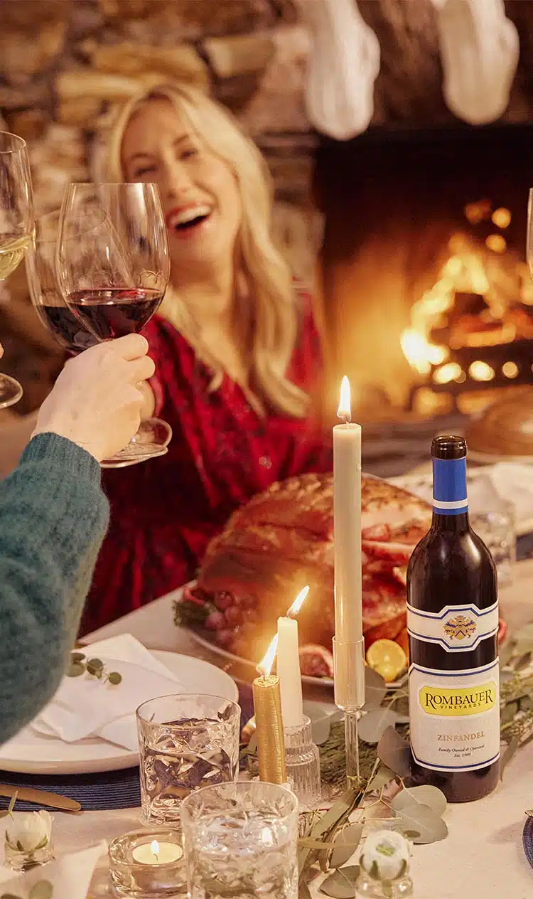 Group Cheers around. a holiday table