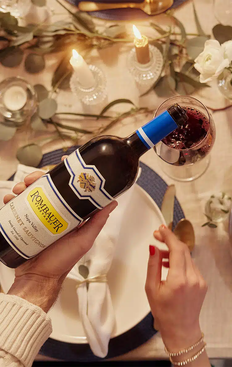 Cabernet pour at dinner table