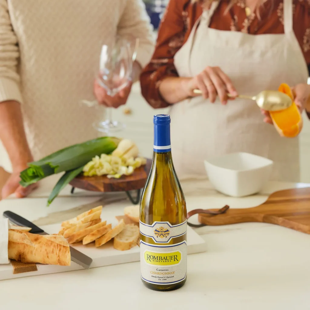 Cooking with Rombauer wine bottle in the forground